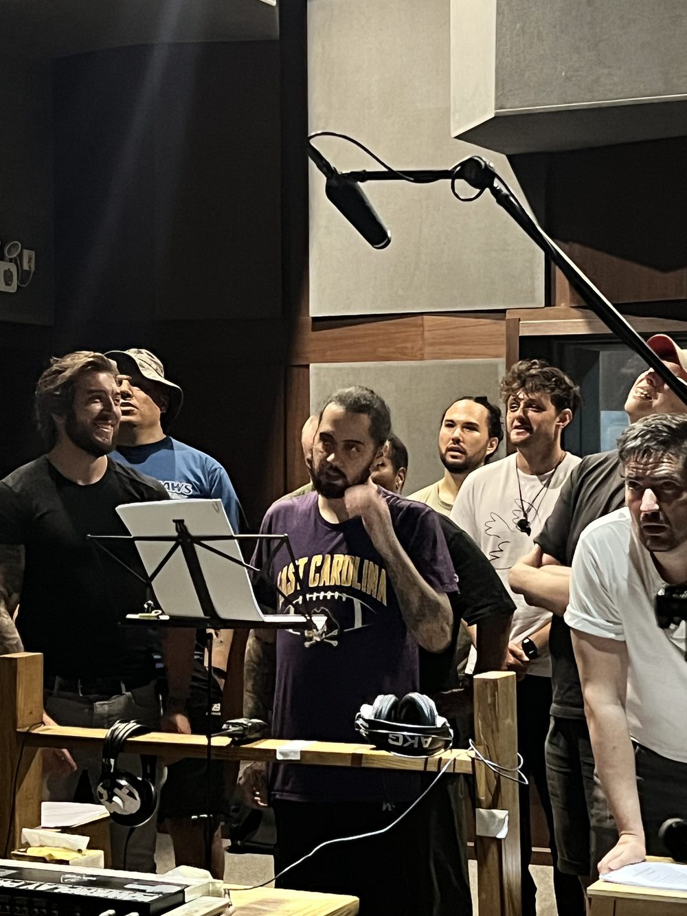 Voice cast during a recording session
